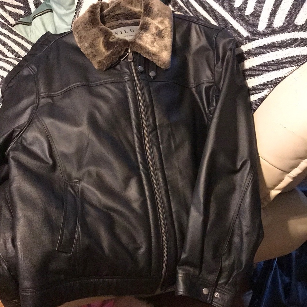 This is a leather jacket that has only been worn once.